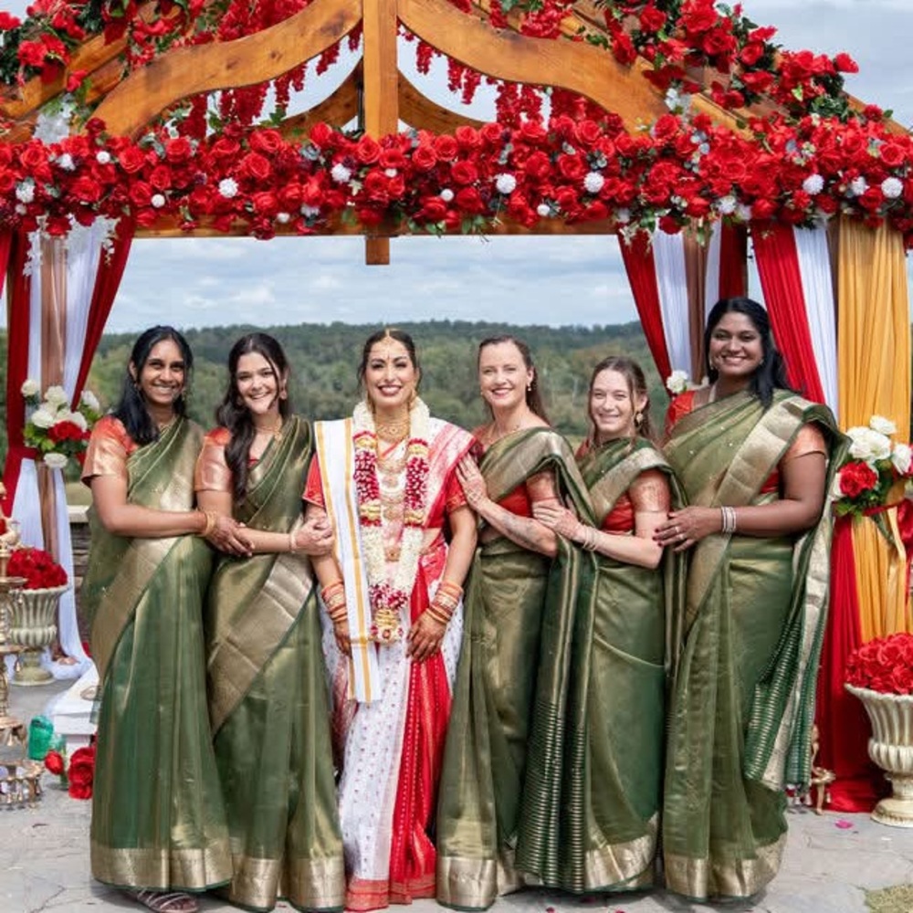 Elegant Red, Green, And Gold Saree